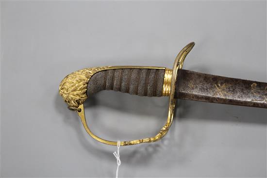 A Georgian infantry officers sword, fine gilt hilt, the curved blade gilt etched with GR and Royal Arms, blade 73.5cm, overall length